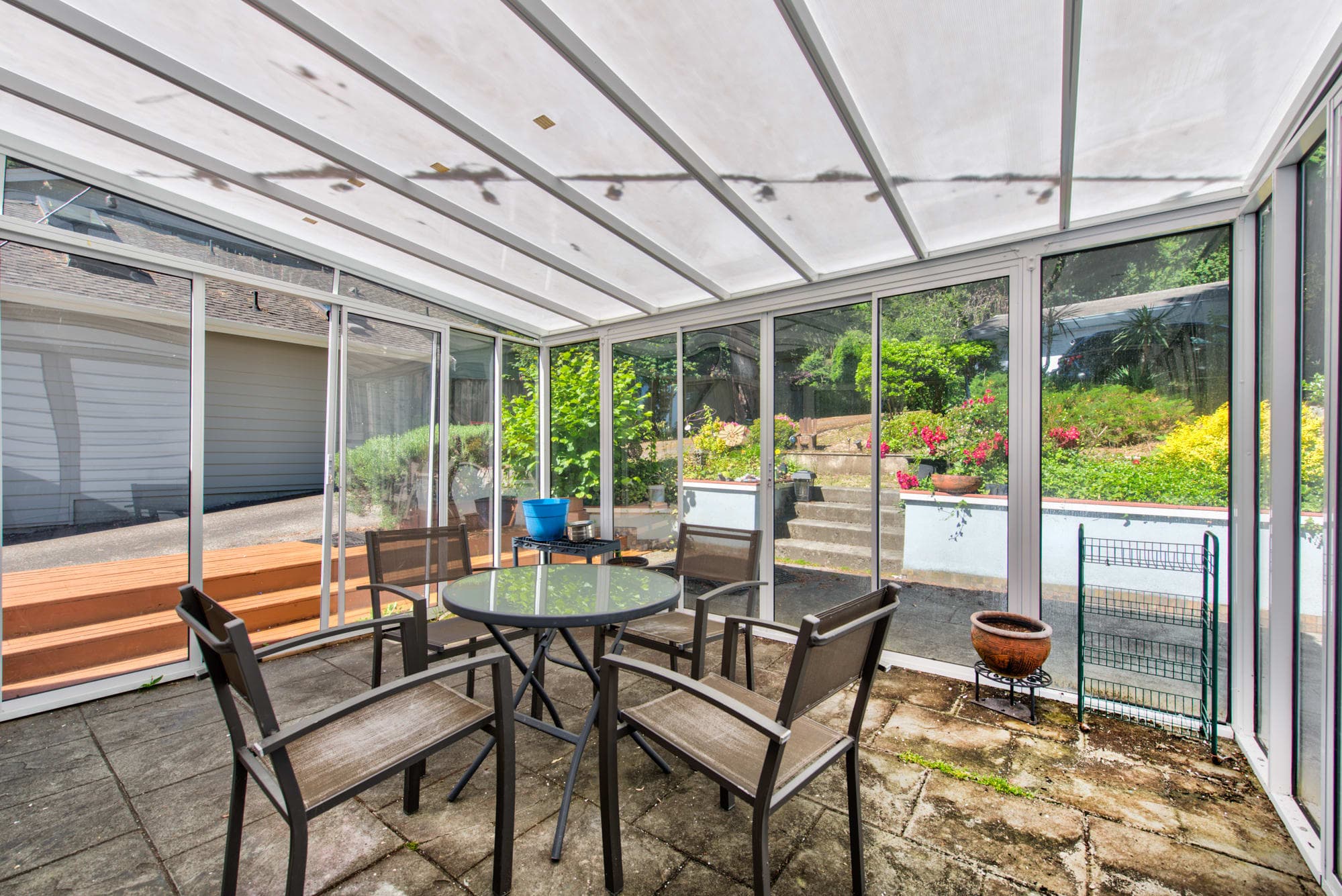 This private seating at the back patio is perfect for enjoying an afternoon snack with the family.