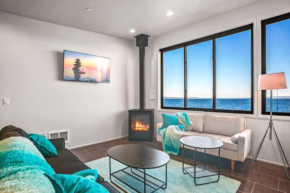 Watch the sunset over the water while enjoying a cozy evening of games and good company