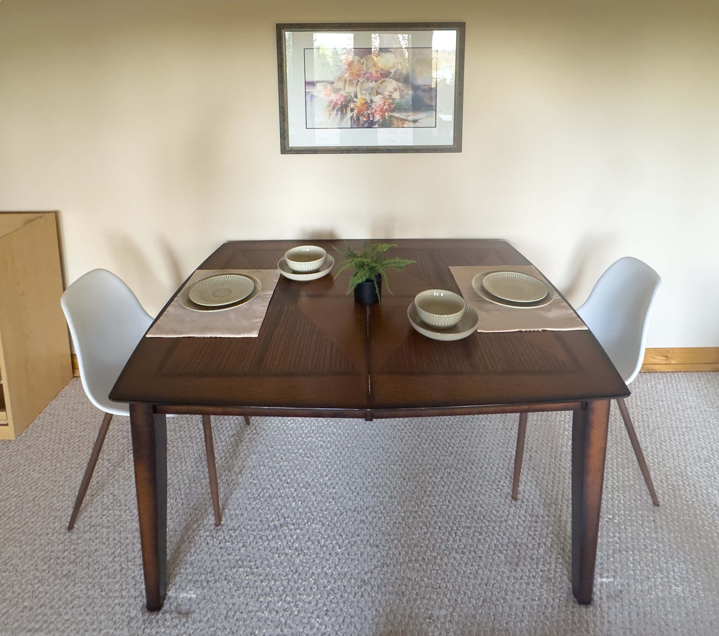 Enjoy a warm, intimate setting where conversation flows effortlessly around the dining table and the view outside.