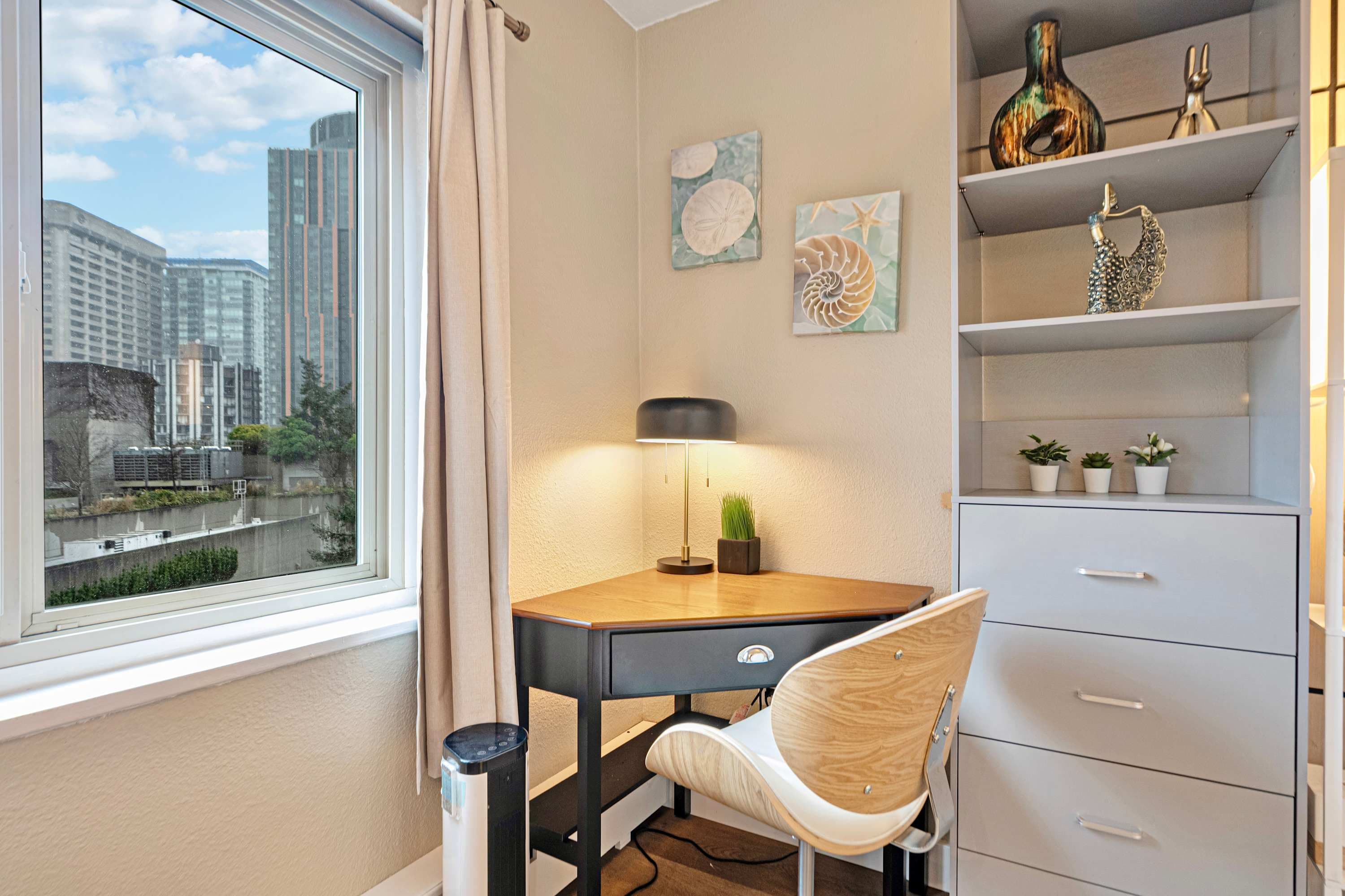 Indulge in productivity or reading at the sunlit, dedicated workspace with a view.