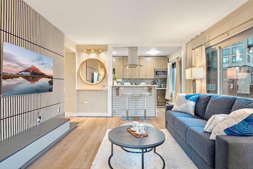 Indulge in a cozy evening in the stylish, open-concept living area.