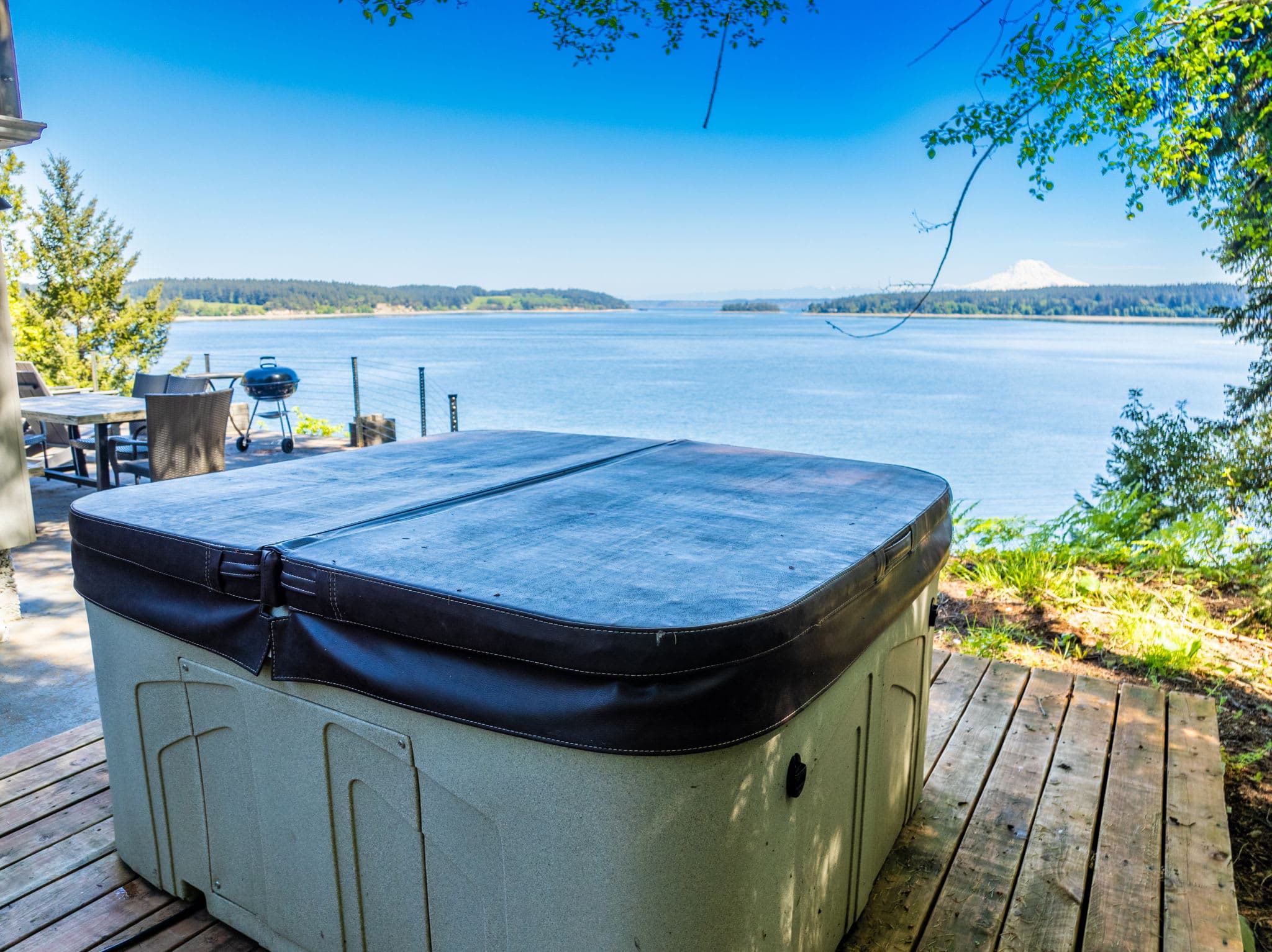 Immerse yourself in pure relaxation with our hot tub, perfectly situated to offer a breathtaking, picturesque view