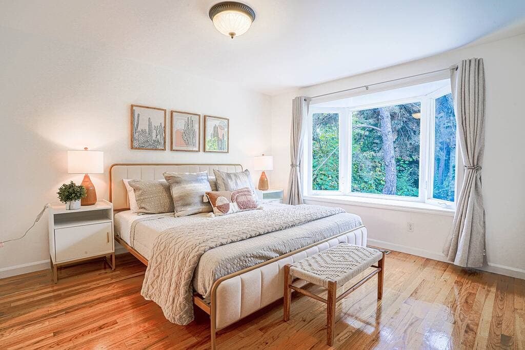 The master King suite (bedroom #1) is located on the main floor of the home. Stay here and enjoy the en-suite bathroom, panoramic windows, and plenty of closet space