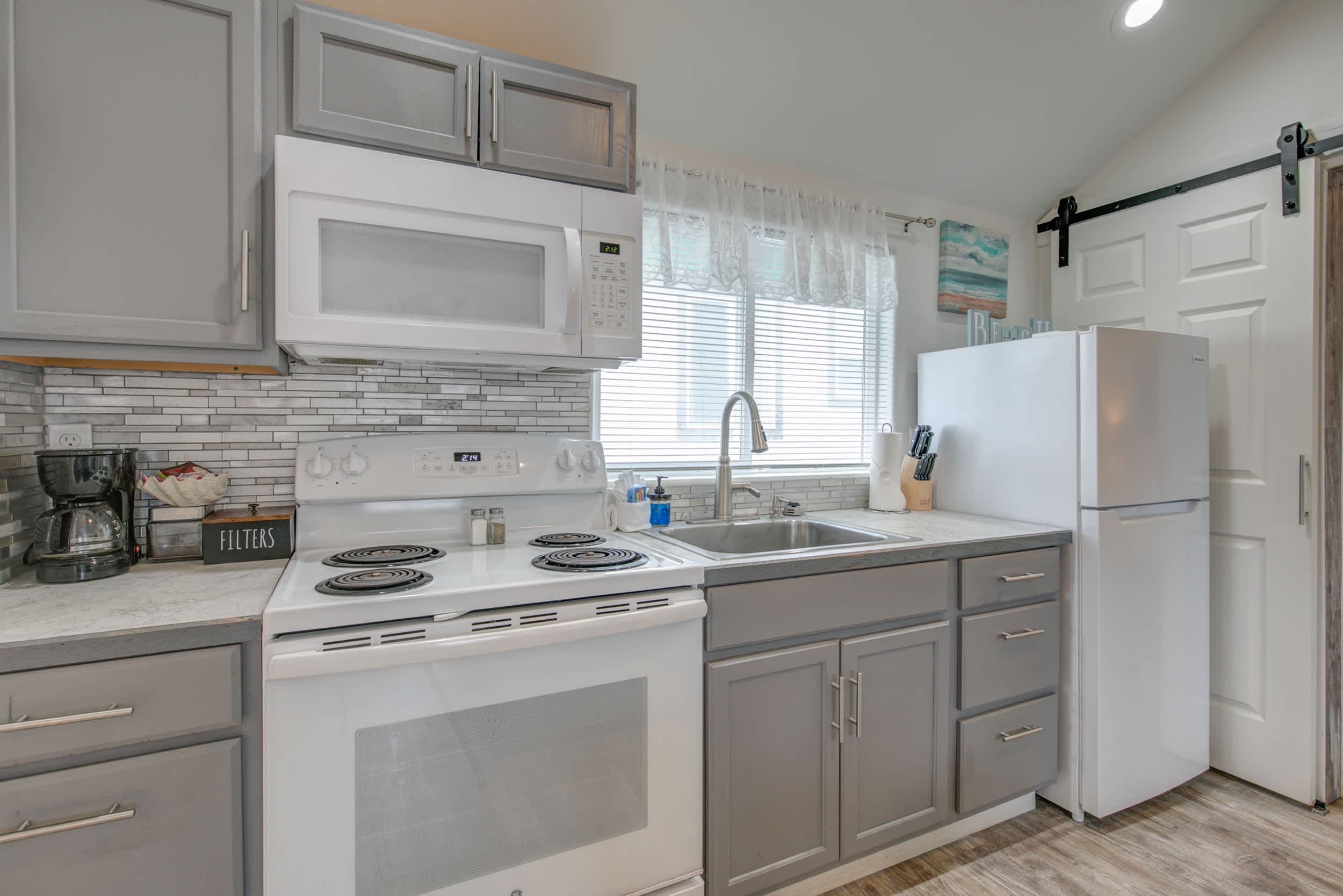 Contemporary kitchen with clean lines, neutral tones, and modern finishes.