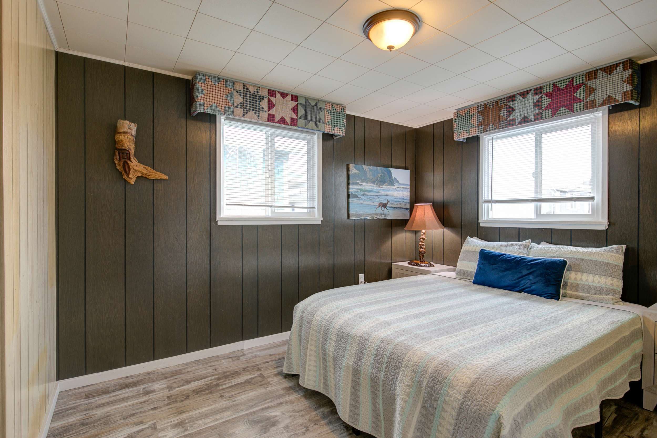 Bedroom 2 featuring a queen bed, perfect for a restful night's sleep.