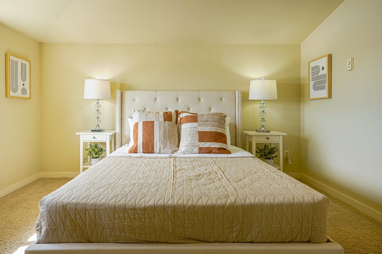 Experience luxury in our master suite, featuring a queen-size bedroom with an ensuite bathroom