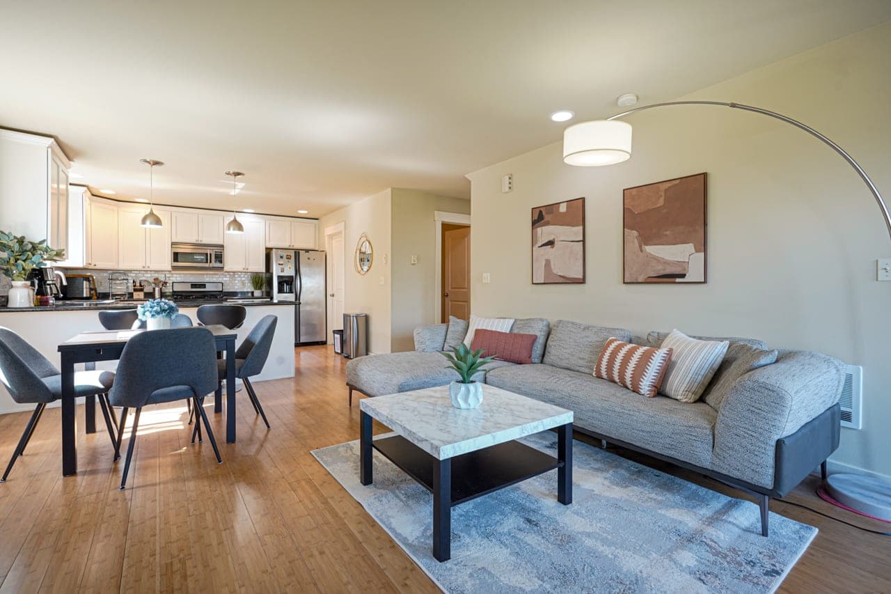 Welcome to your haven of modern living in our Stylish North Seattle Townhouse- Dual Master Suites